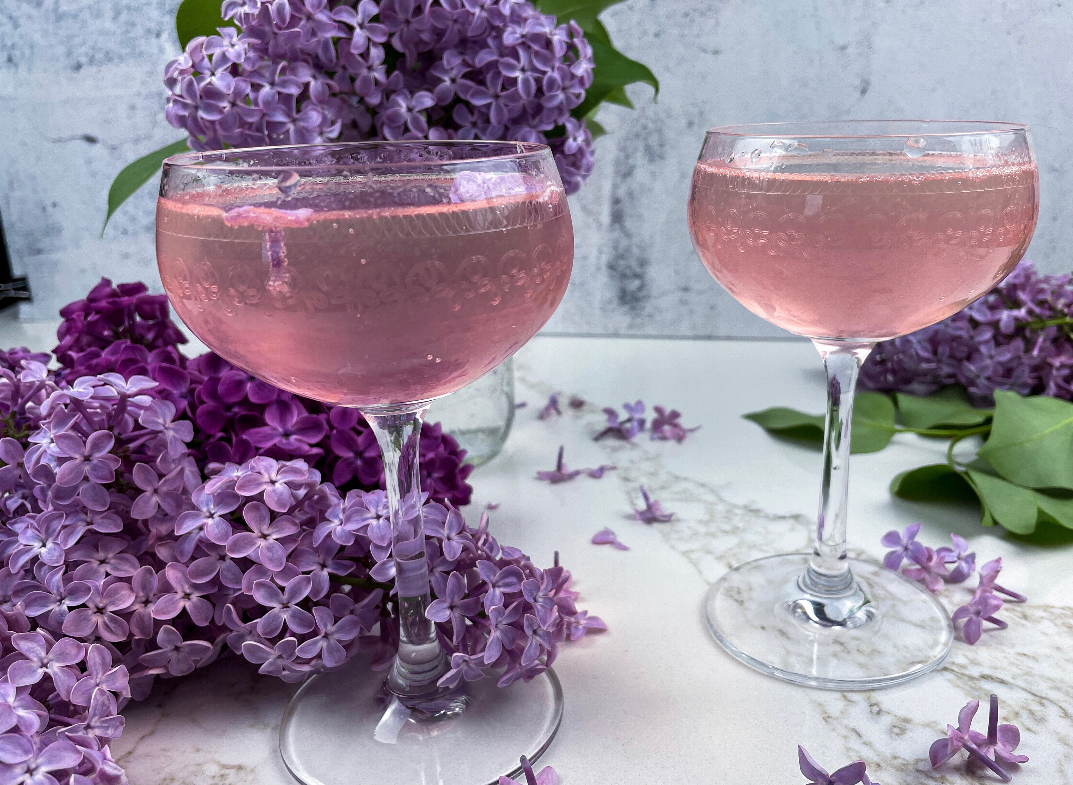 Two glasses of Lilac French 75