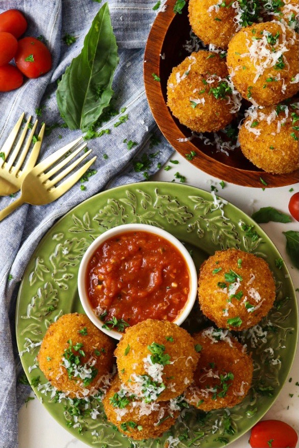 Mozzarella stuffed arancini with marinara sauce