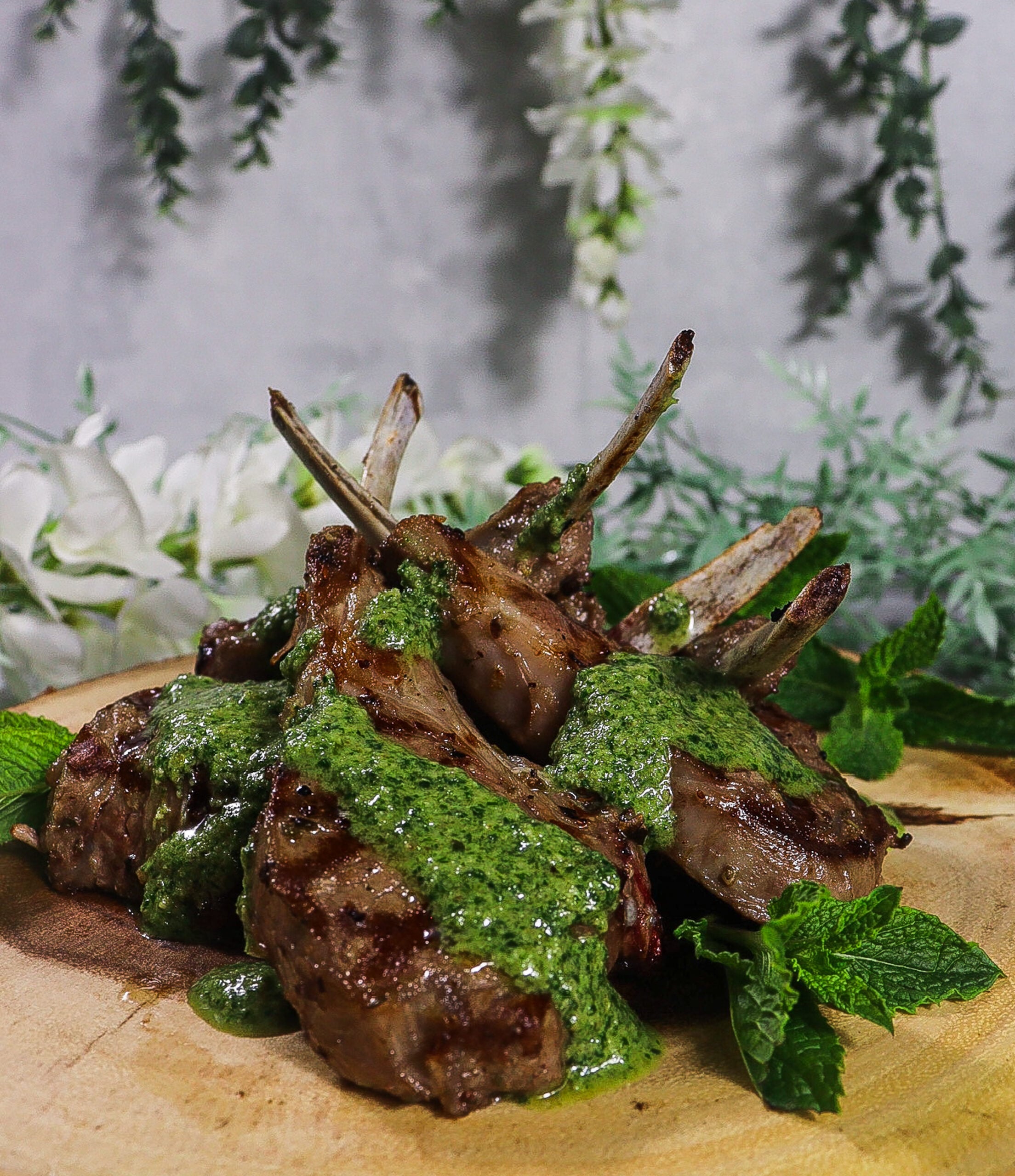 Juniper Grilled Lamb Chops with Arugula Mint Pesto