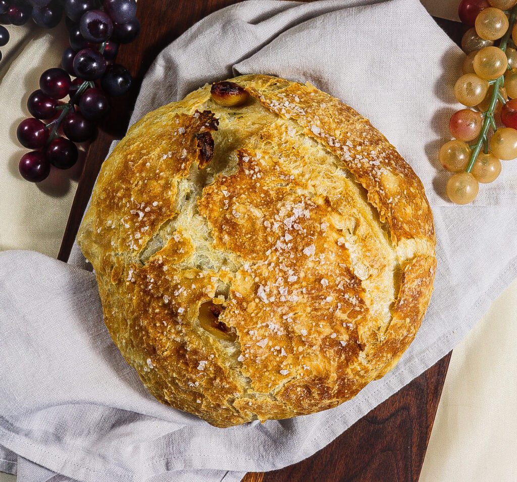 a loaf of garlic bread on a cloth