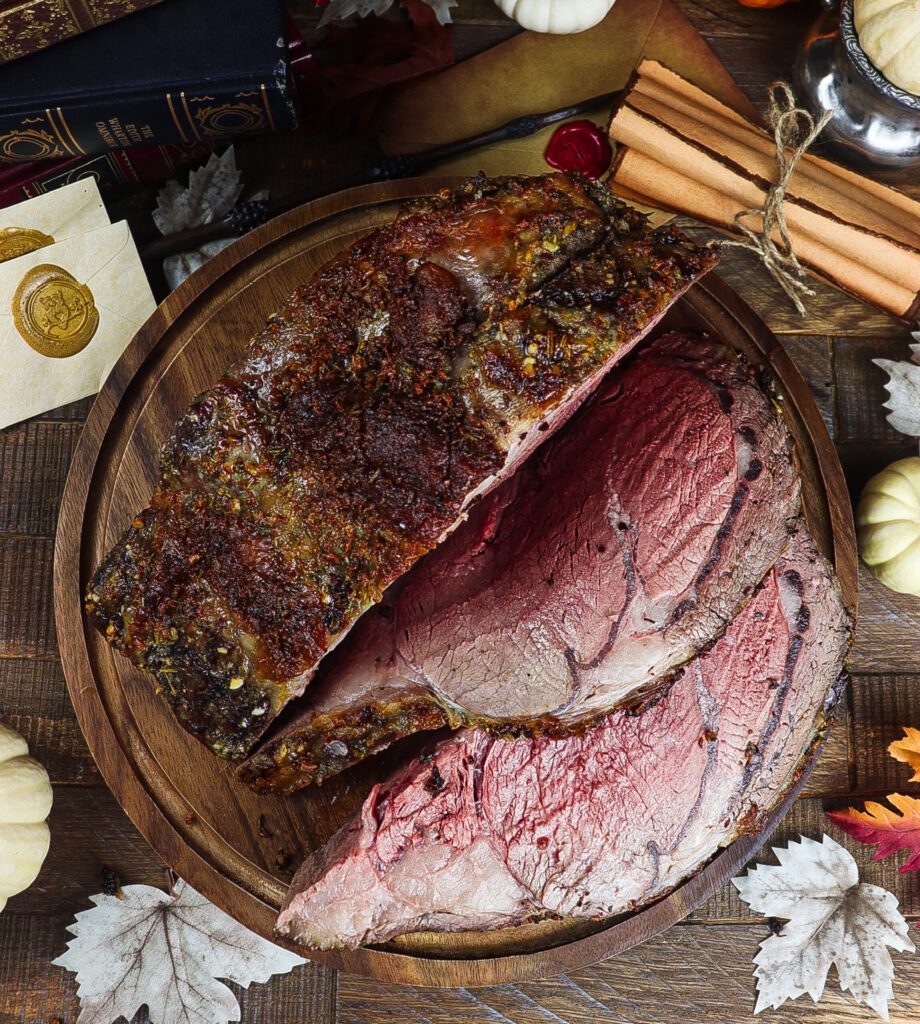 A large roast beef sliced on a cutting board