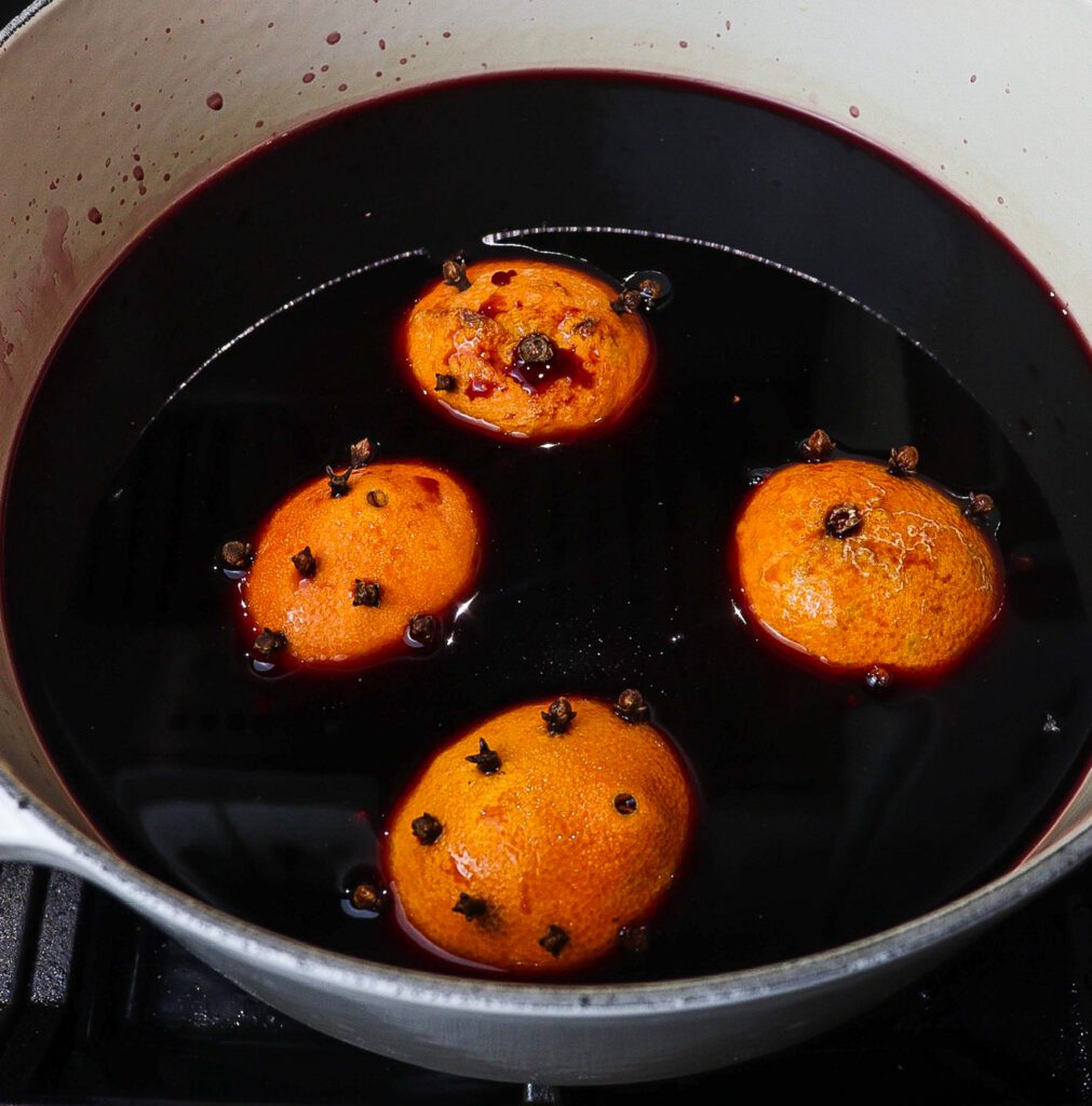 christmas bowl of smoking bishop, victorian mulled wine recipe, recipes from a christmas carol