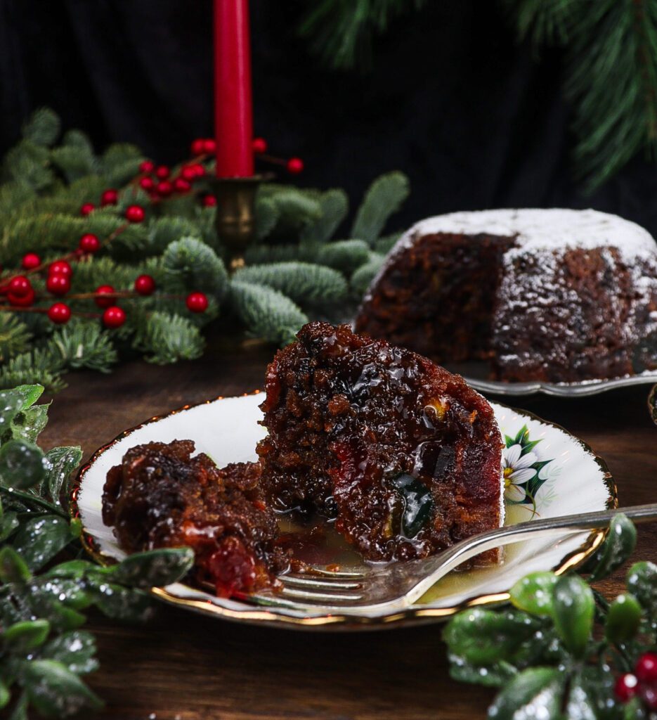 plum pudding with brandy butter sauce, traditional plum pudding