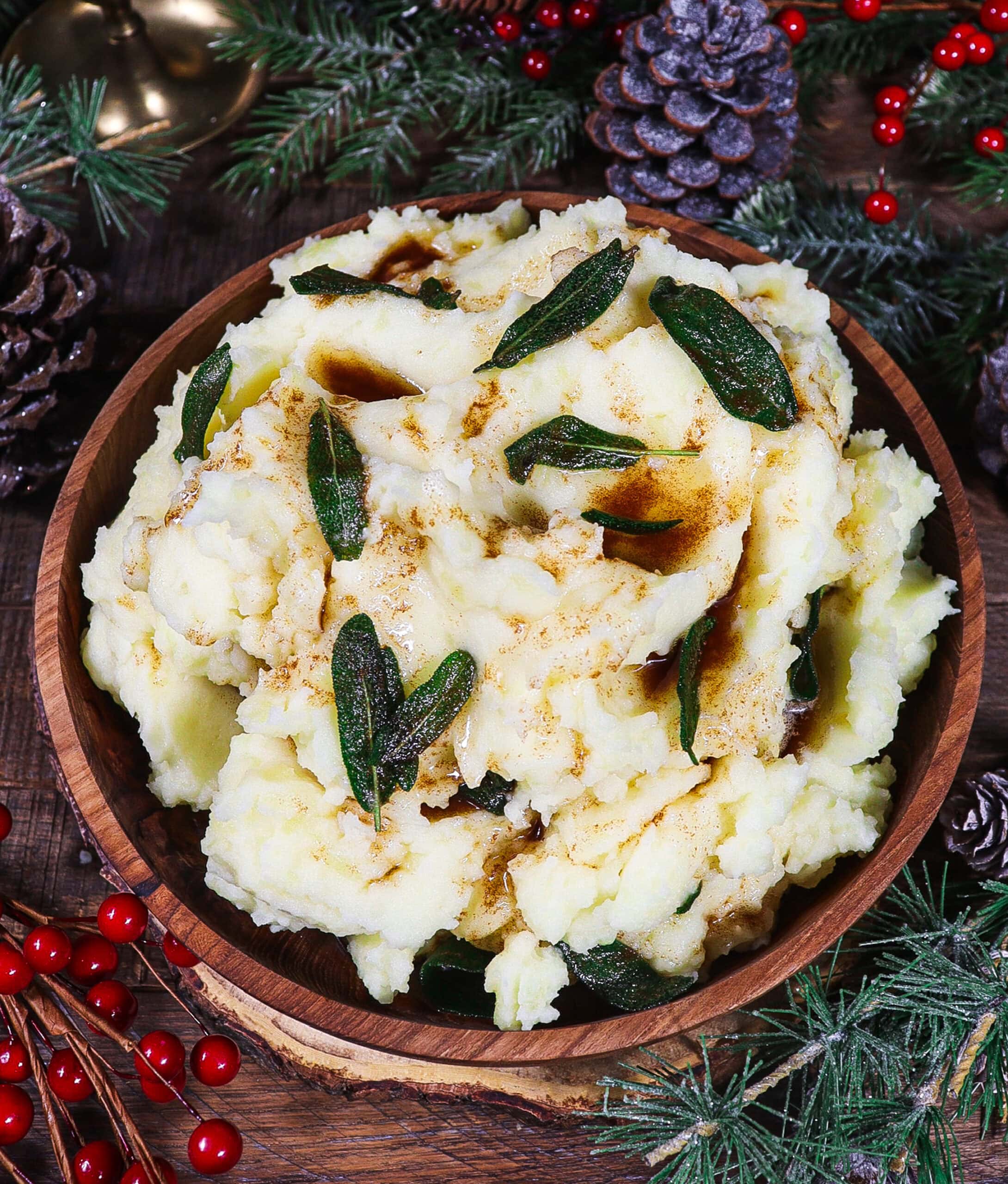 mashed potatoes with sage in a rustic bowl