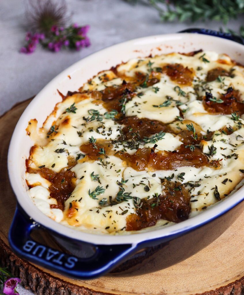baked goat cheese appetizer, caramelized onions and goat cheese