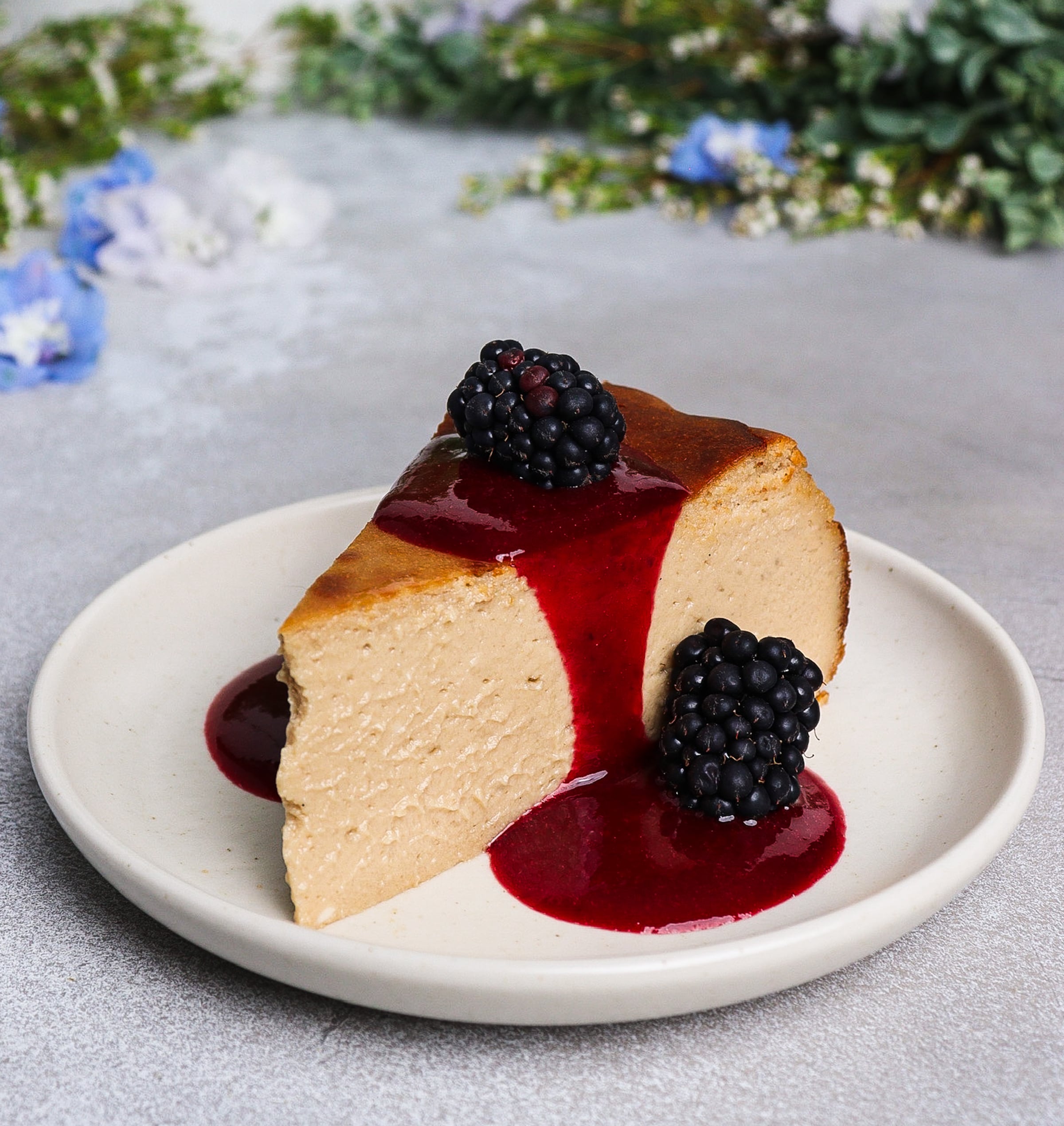 London Fog Basque Cheesecake with Blackberry Sauce