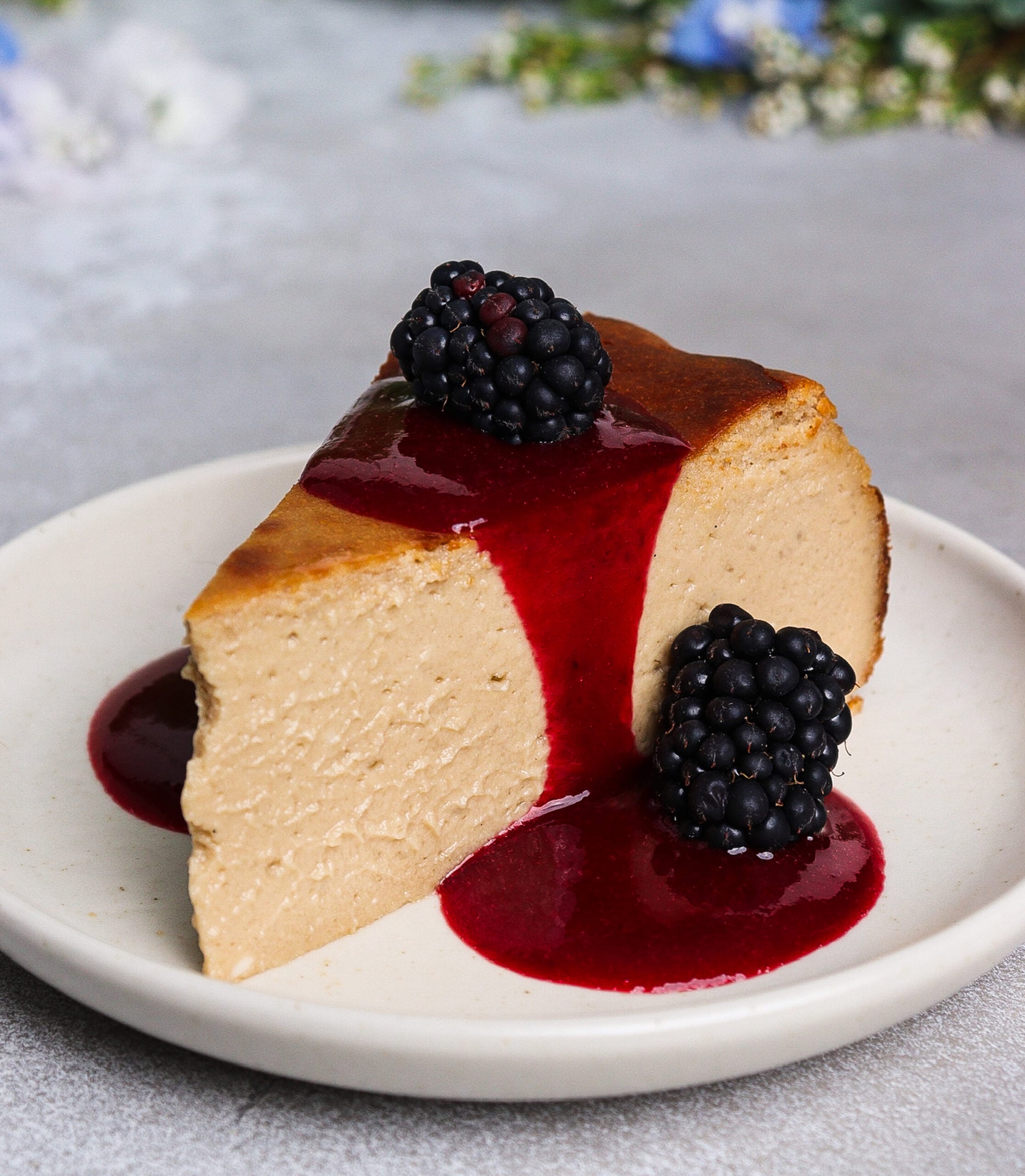london fog cheesecake, cheesecake with blackberry sauce, earl grey basque cheesecake