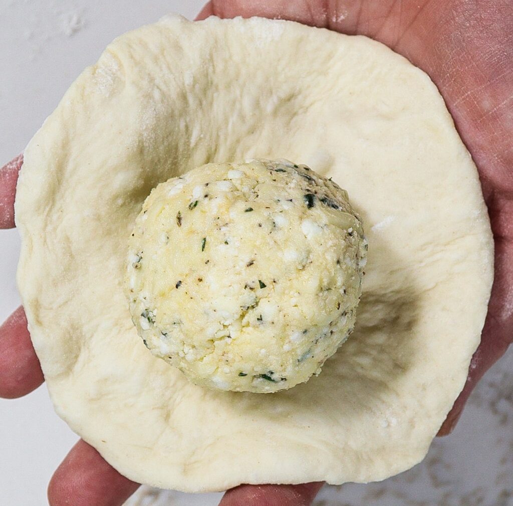 cheese and herb stuffed flatbread, cheese filled flatbread