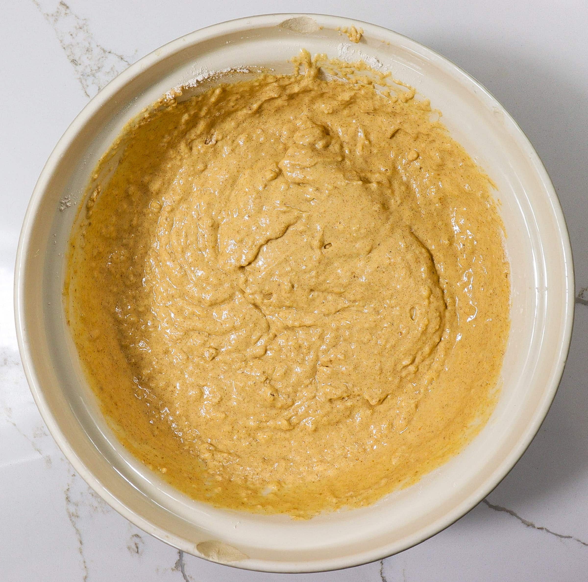 pumpkin pancake batter in a mixing bowl, fall pancake recipe