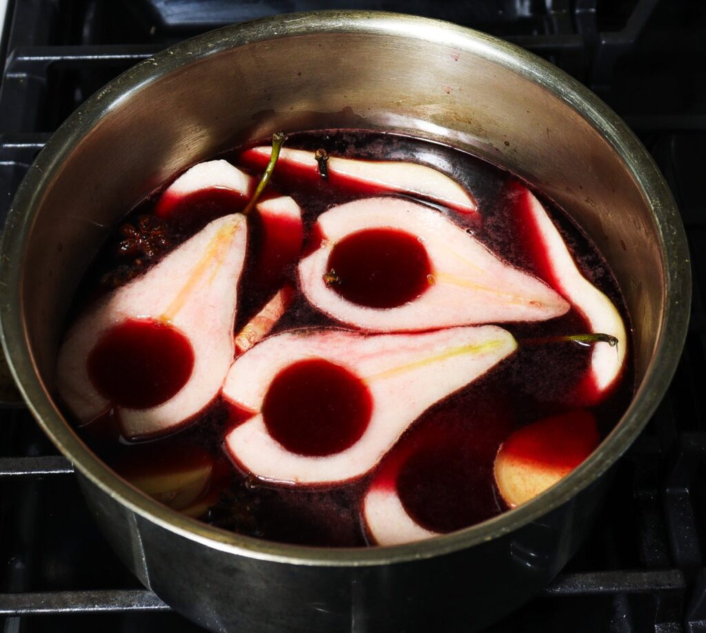 poached pear pavlova, spiced pear pavlova