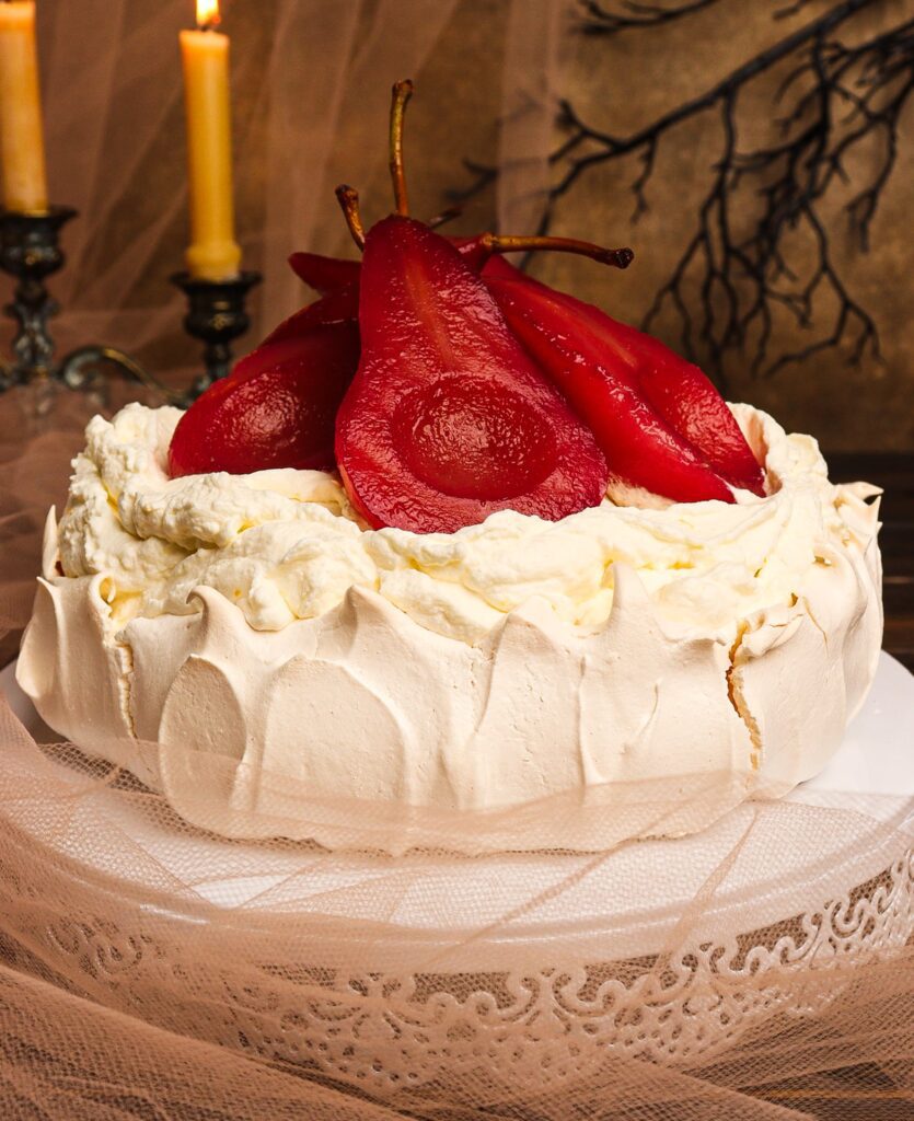 poached pear pavlova, mulled pear pavlova