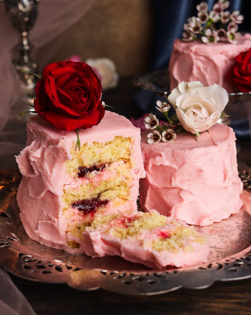 raspberry almond cake, almond cake with buttercream frosting, literary recipes