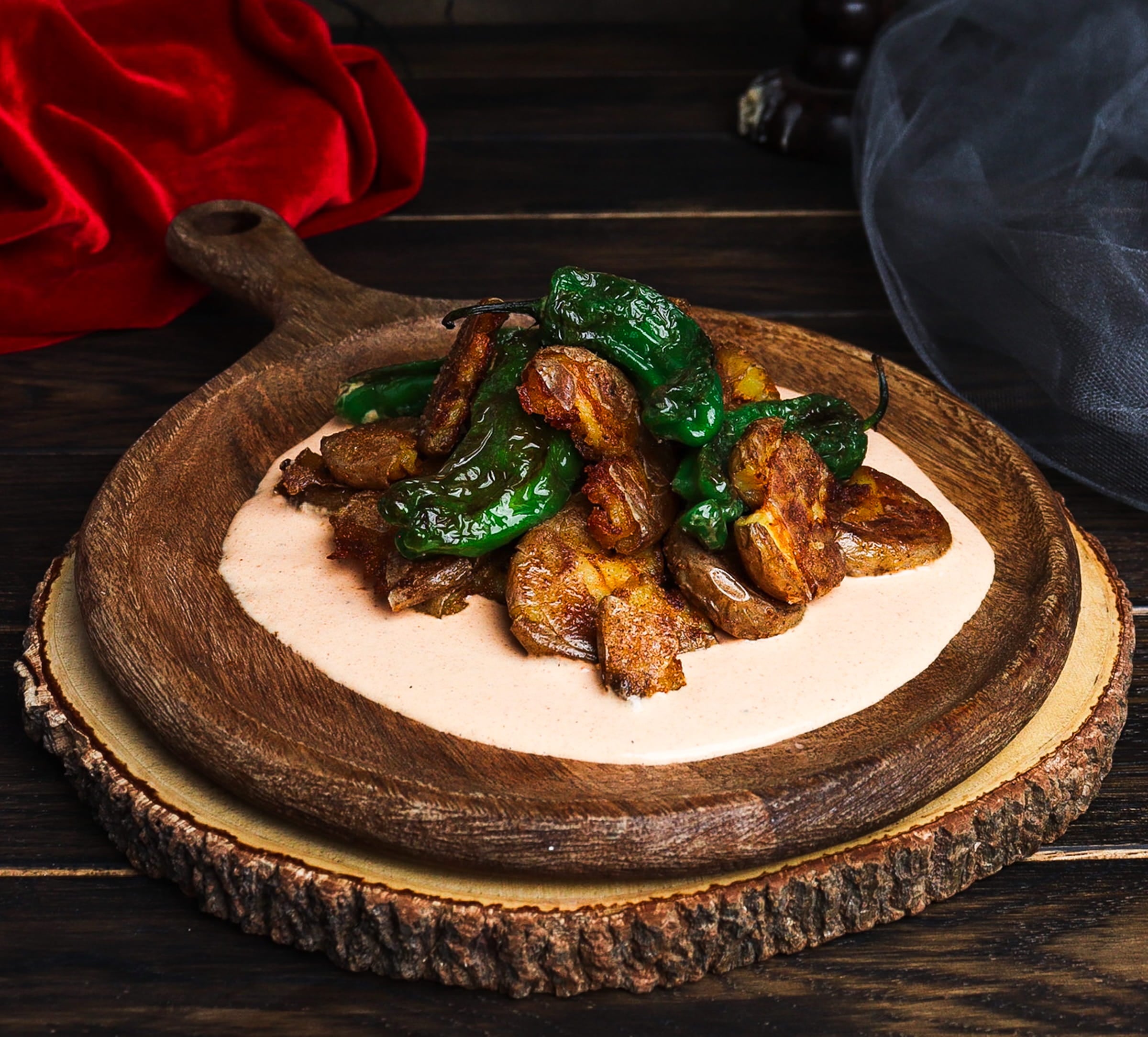 spicy smashed potatoes, blistered peppers