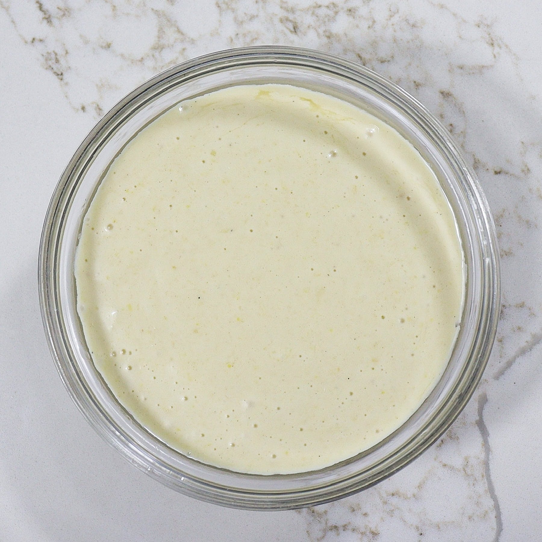 grilled lemon vinaigrette in a mixing bowl