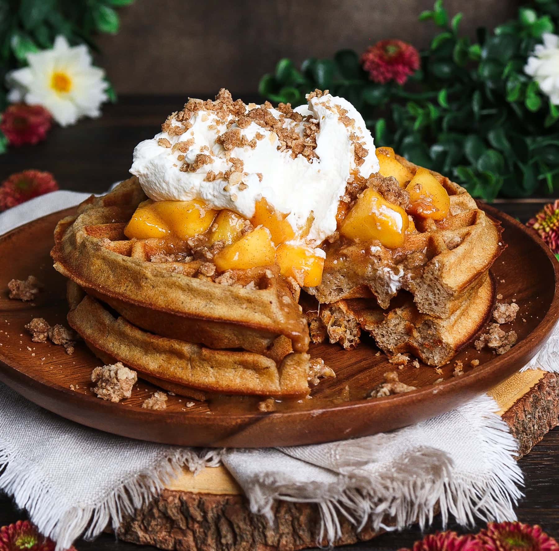 Peach crisp waffles with whipped cream