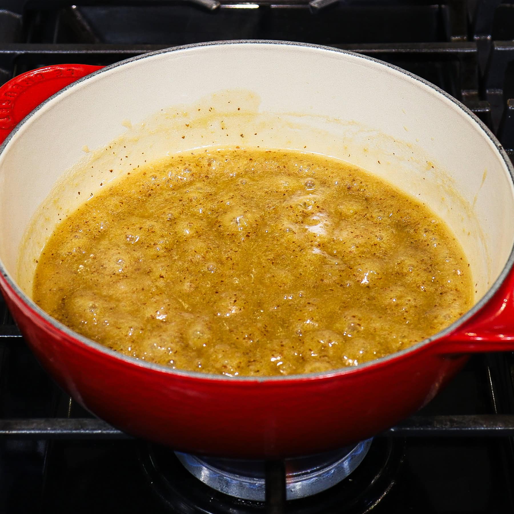 honey mustard beer glaze in a saucepan