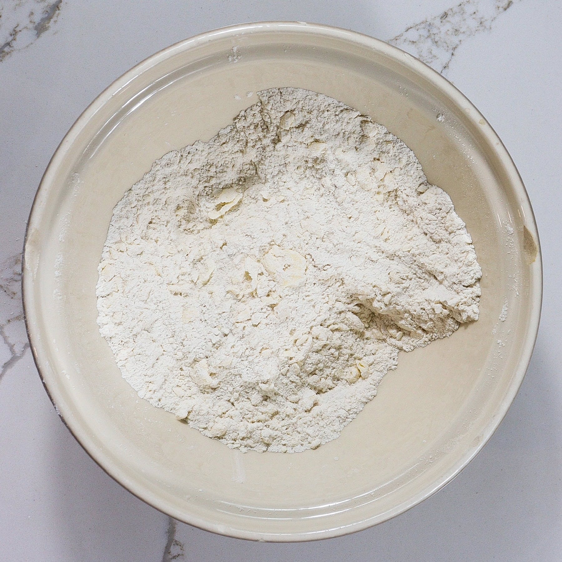 dry ingredients for beer biscuits in a mixing bowl