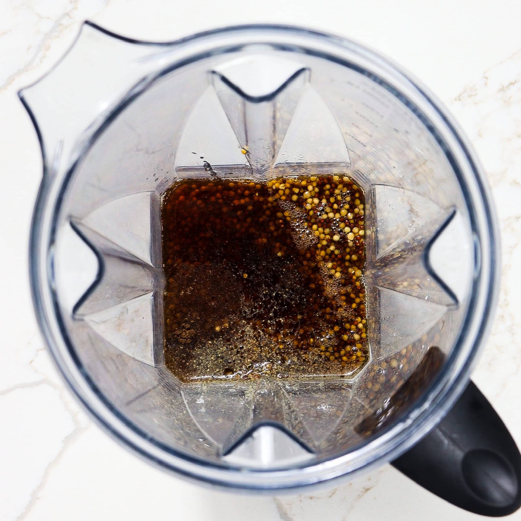 beer soaked mustard seeds in a blender