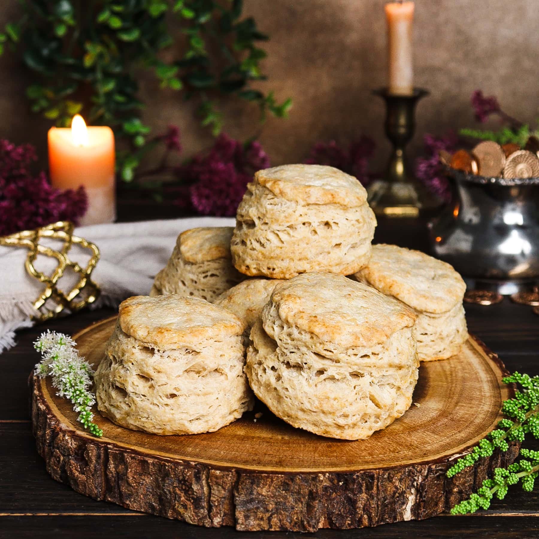 beer biscuits on a rustic wooden stump and background inspired by the Misty Mountains