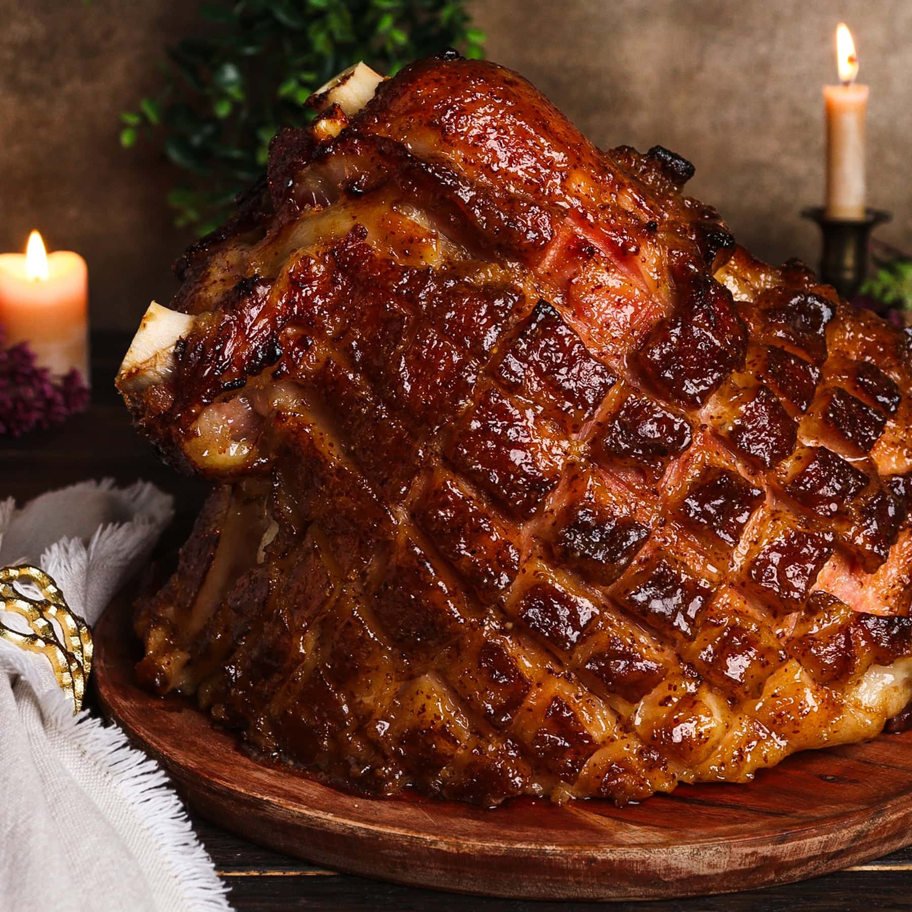 honey mustard glazed ham on a rustic platter