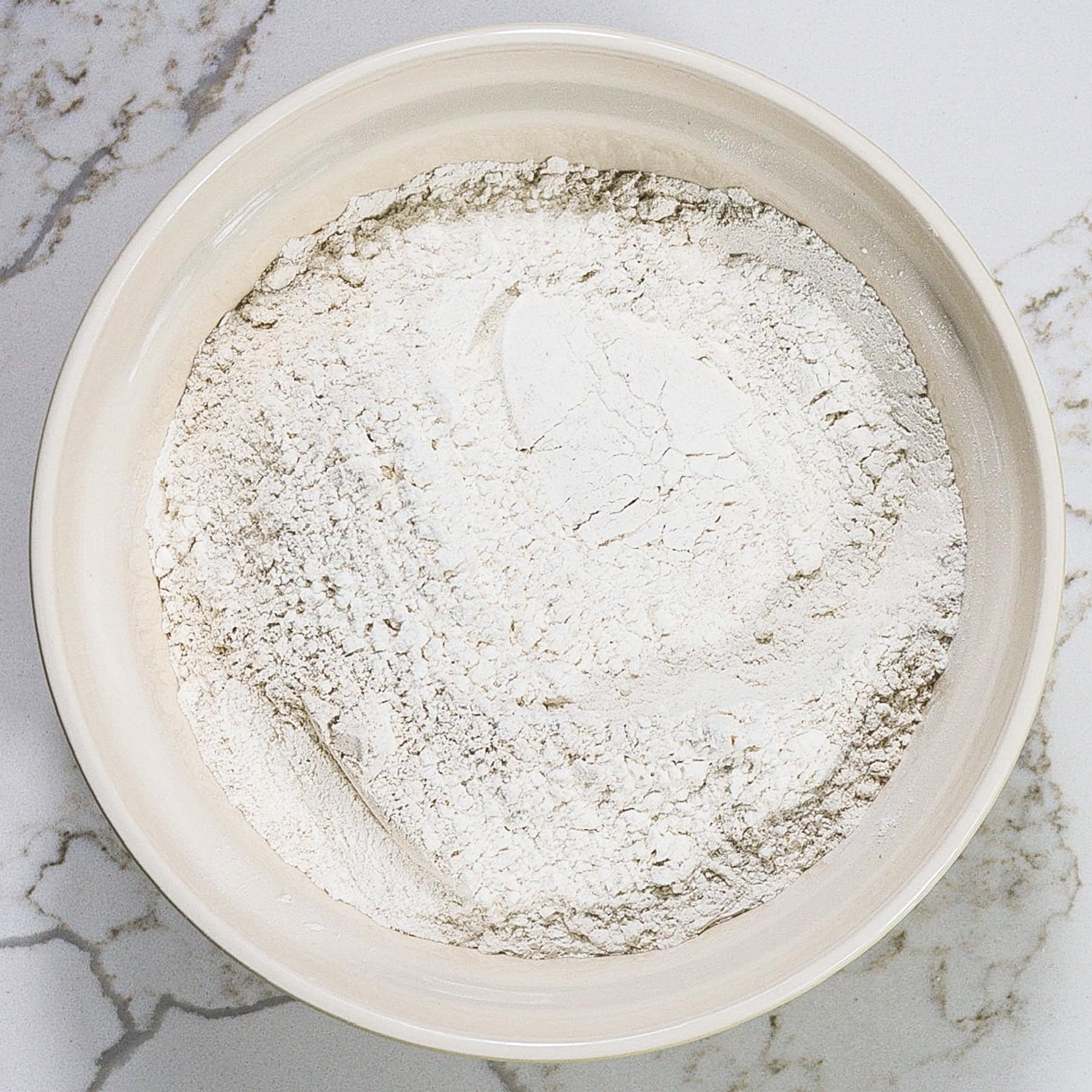 dry ingredients for soft barley bread in a mixing bowl