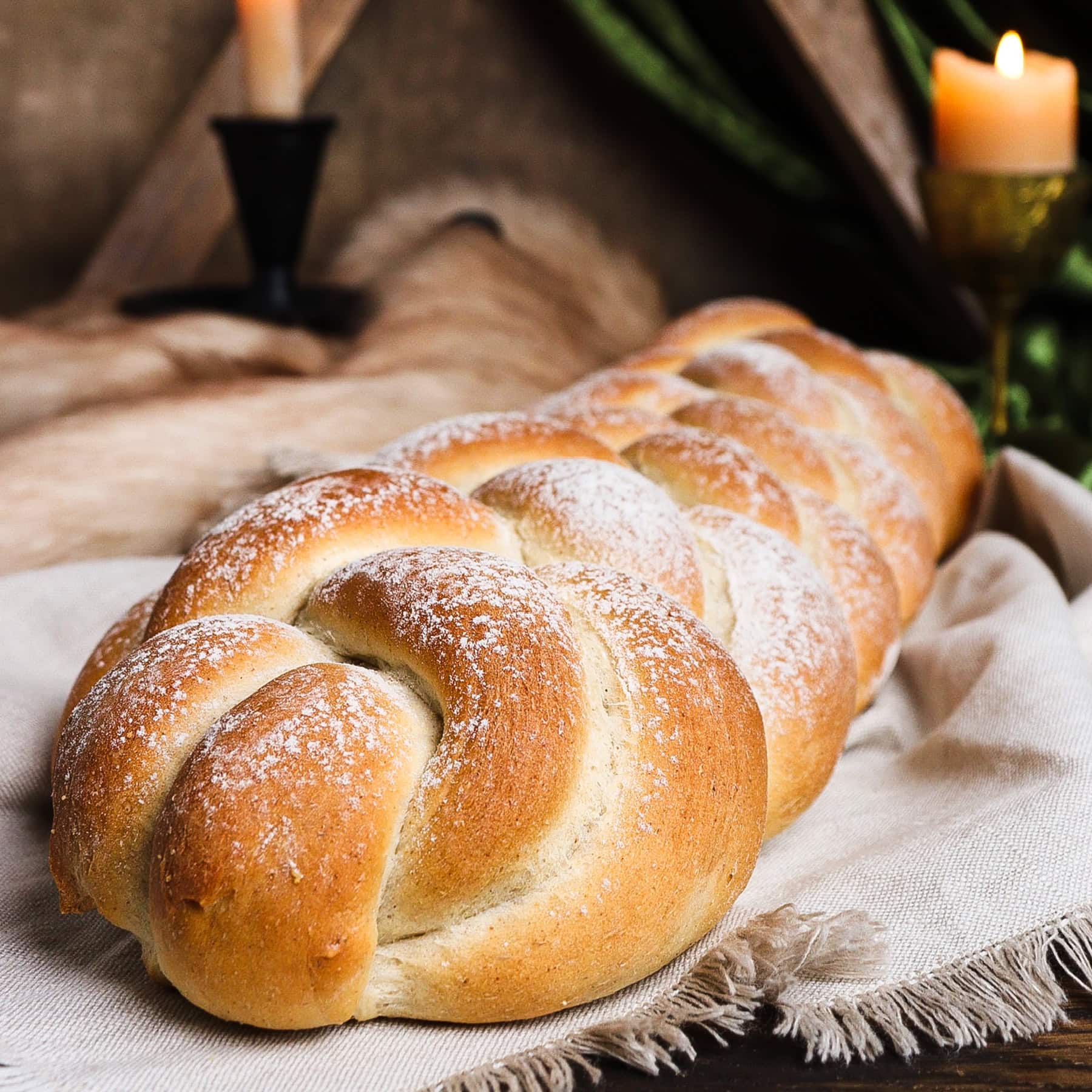 braided soft barley bread in a rustic setting inspired by Meduseld of Rohan