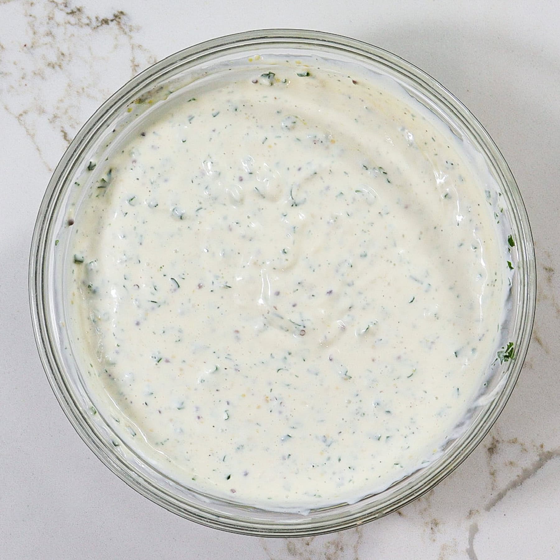 creamy mustard and horseradish sauce in a mixing bowl for beef tenderloin