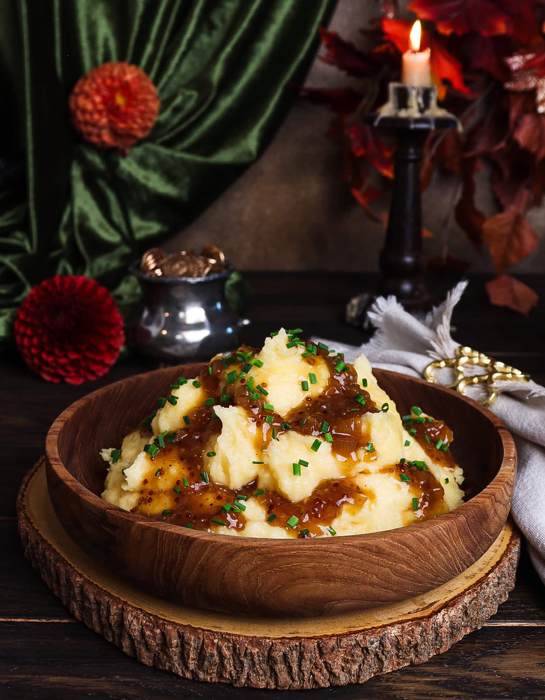 cheddar ale mashed potatoes on a rustic plate in a setting inspired by dwarves of Middle Earth
