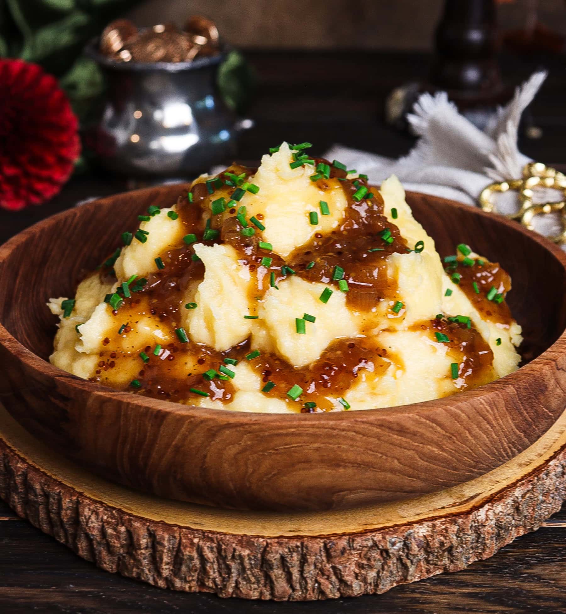 cheddar and chive mashed potatoes on a rustic platter