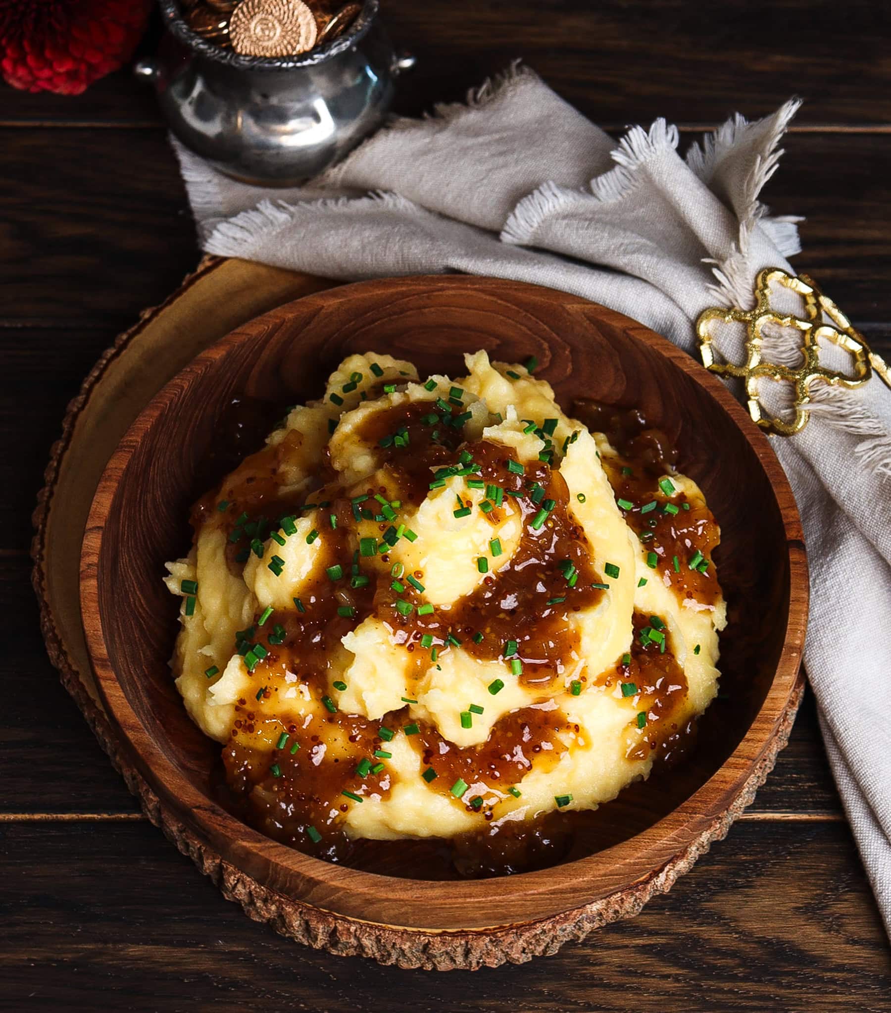 cheddar mashed potatoes in a rustic bowl