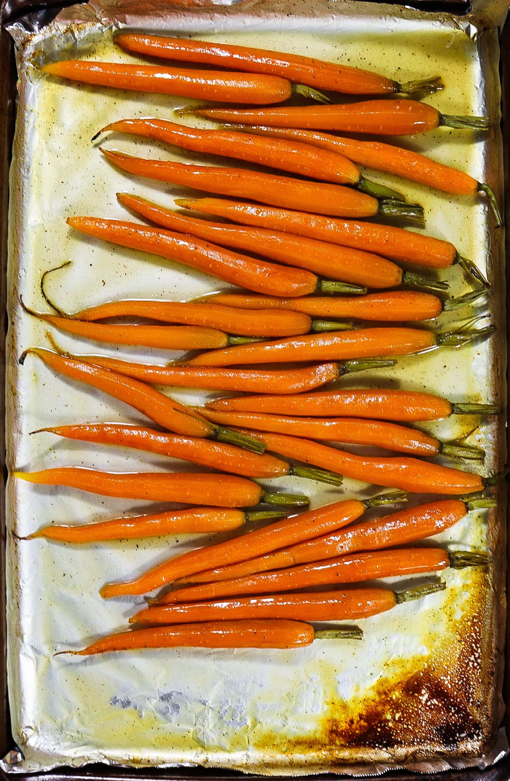 cider roasted carrots on a sheet pan