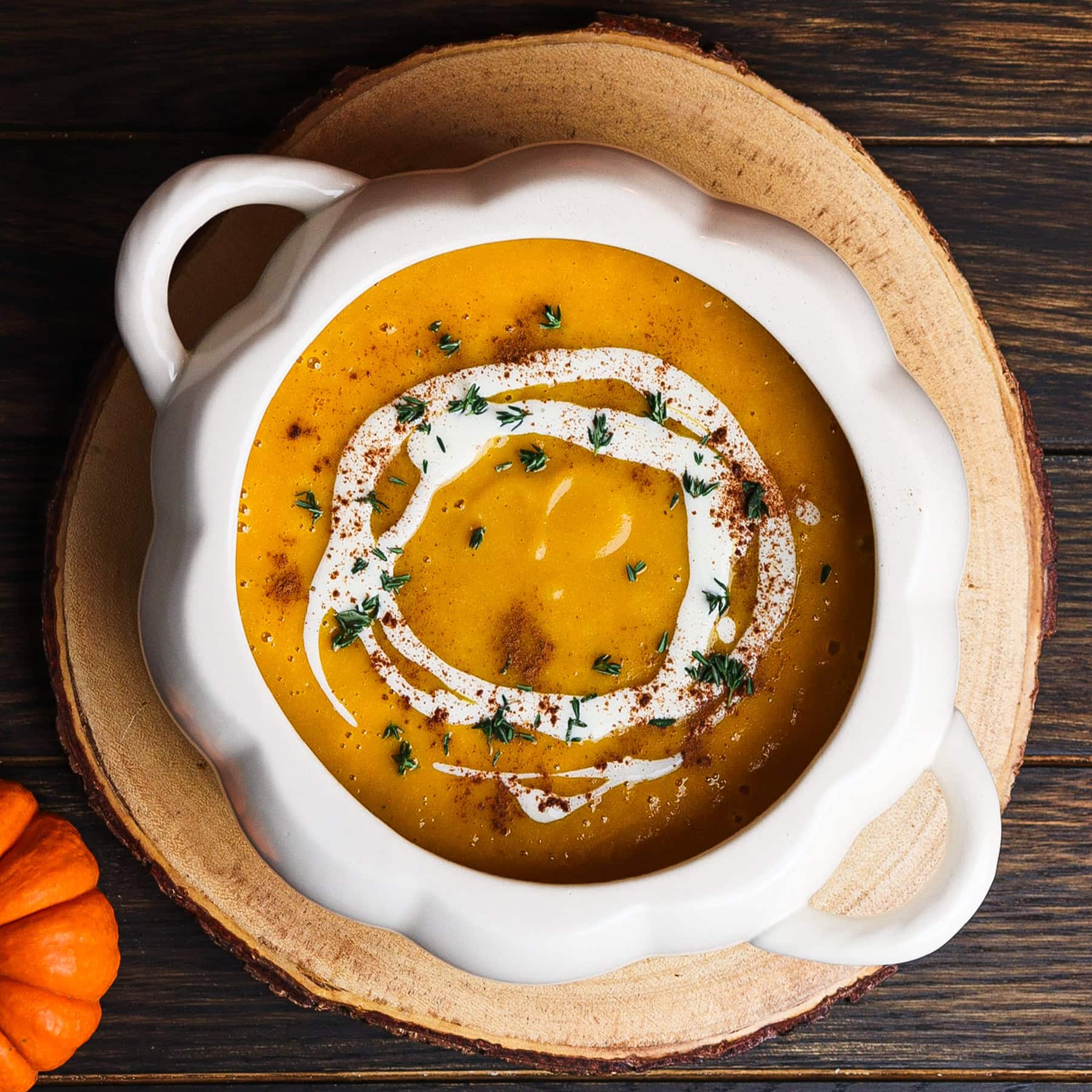 autumn harvest soup on a rustic stump