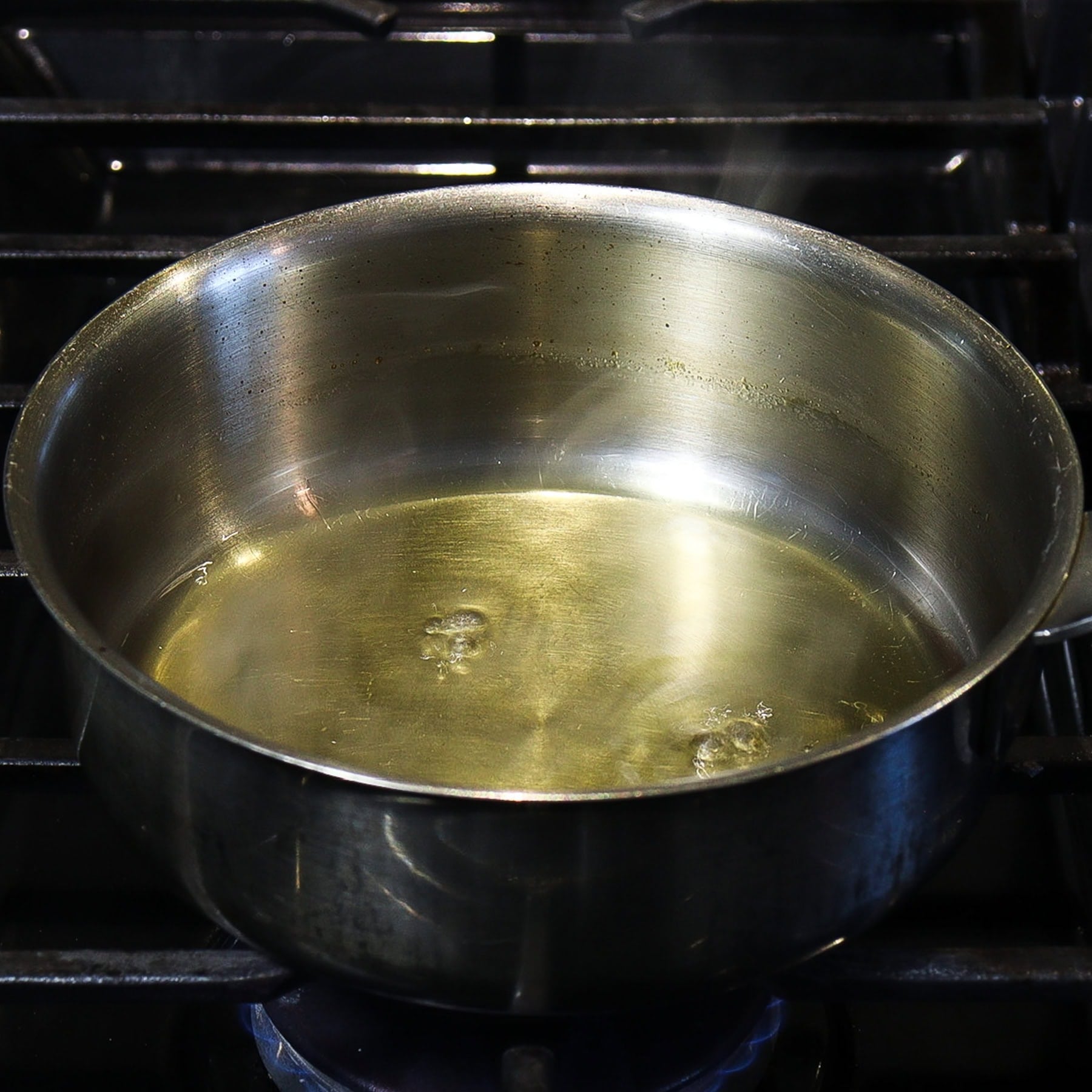 Tokaji wine reducing in a pot on the stovetop 