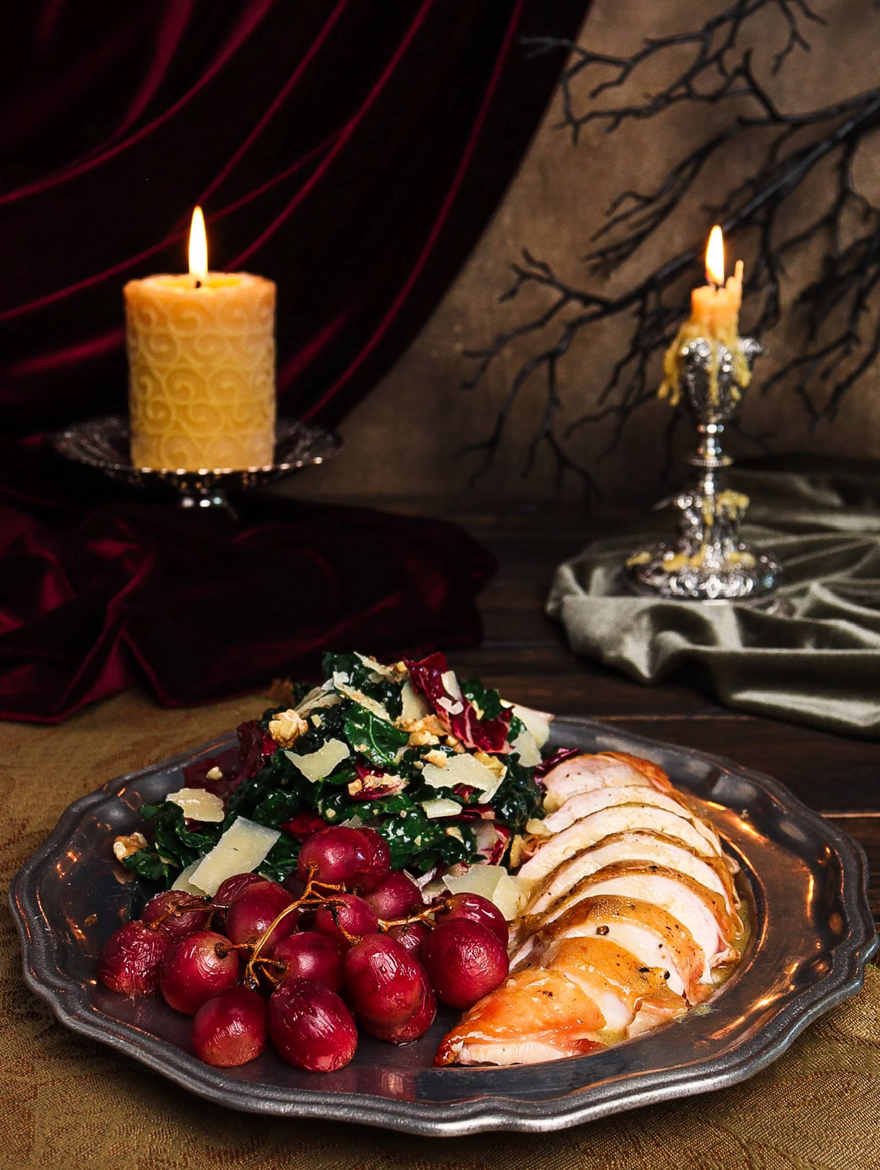 chicken salad with grapes for a dracula menu in a gothic setting on a silver platter